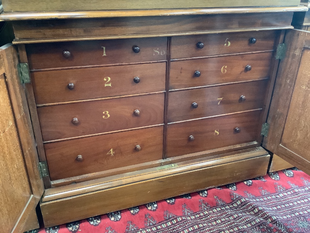 A 20th century teak table top double display case, from the Library of the Royal College of Surgeons, width 103cm depth 128cm height 108cm